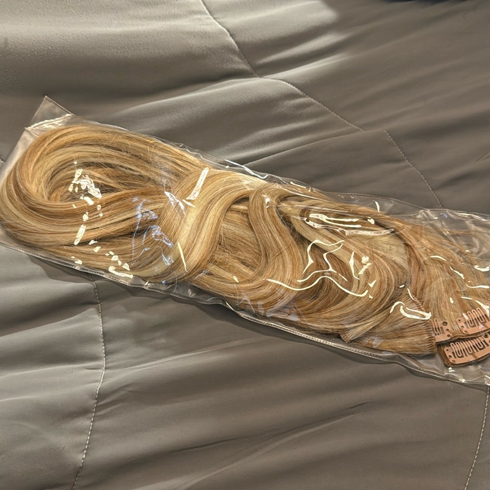 Clip in Extensions  never worn  various shades of blonde